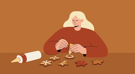 Blond woman decorates holiday cookies with frosting in a warm, brown setting