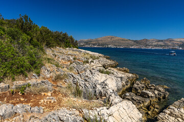 Empty pebble beaches, walking path along the island of Ciovo to Pendi Lagoon, panorama overlooking Ciovo and Trogir Croatia