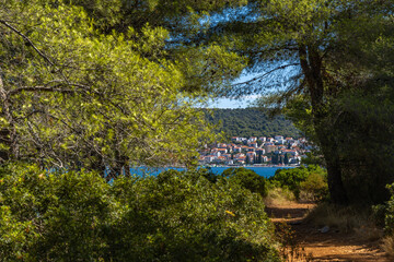 Empty pebble beaches, walking path along the island of Ciovo to Pendi Lagoon, panorama overlooking...