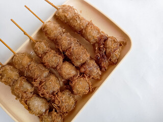 Cilor Tusuk is Tapioca Balls Wraped with Egg and Deep Fried, traditional Indonesian street food.