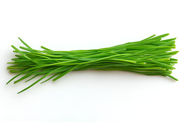 A freshly harvested bunch of vibrant green chives, a common culinary herb, isolated on a clean white background.
