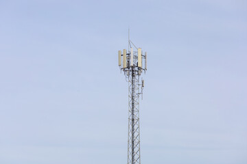 telecommunication  towers stand against a sky, modern wireless communication. for broadcasting 6G, 5G, and signals for telecommunications infrastructure, and the expansion of digital connectivity.