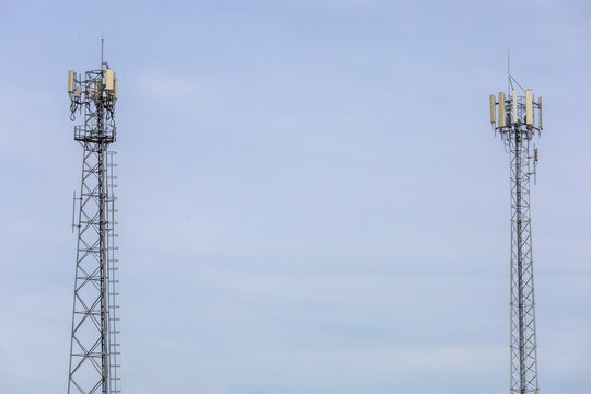 telecommunication  towers stand against a sky, modern wireless communication. for broadcasting 6G, 5G, and signals for telecommunications infrastructure, and the expansion of digital connectivity.