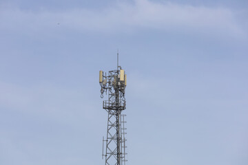 telecommunication  towers stand against a sky, modern wireless communication. for broadcasting 6G, 5G, and signals for telecommunications infrastructure, and the expansion of digital connectivity.