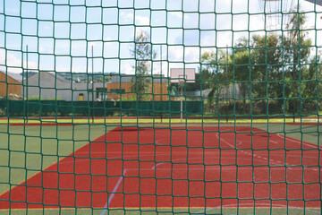 A closed playing field. A fenced sports area where play is prohibited due to external restrictions.