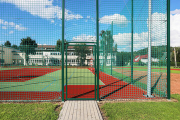 A closed playing field. A fenced sports area where play is prohibited due to external restrictions.