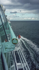 Outdoor promenade boat sun deck onboard modern luxury cruiseship cruise ship liner with loungers...