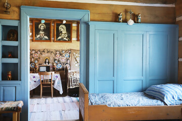 ZUBRZYCA GORNA, POLAND - AUGUST 03, 2025: Historic interiors of a country house. The Orava Ethnographic Park Open-Air Museum in Zubrzyca Gorna.