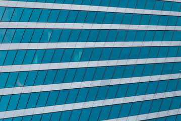 wall of a modern building with many lines on a city street
