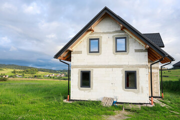 Construction site of a detached house in the countryside.