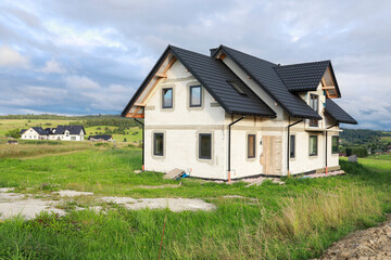 Construction site of a detached house in the countryside.