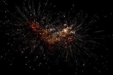 Brilliant burst of colorful fireworks display against night sky
