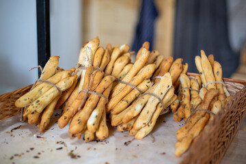 Breadsticks, grissini, grissino, sold in the form of bars. French sticks, salted with caraway,...