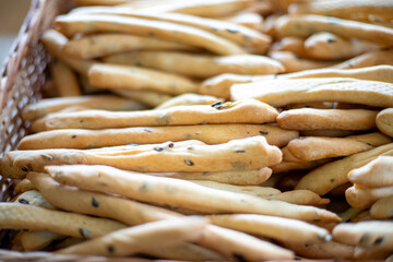 Breadsticks, grissini, grissino, sold in the form of bars. French sticks, salted with caraway,...