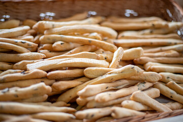 Breadsticks, grissini, grissino, sold in the form of bars. French sticks, salted with caraway,...