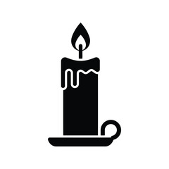 Black candle silhouette with dripping wax romantic flame isolated on white background