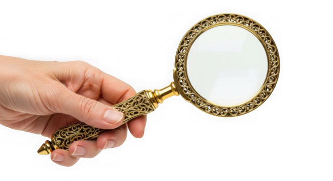 A hand holds an ornate gold magnifying glass against a transparent background for inspection and examination - Powered by Adobe