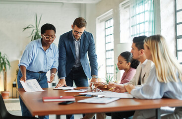 Group of young business people having a meeting or presentation and seminar in the office. Portrait of a young businessman leader