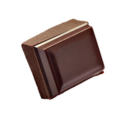 close up of chocolate pieces on white background