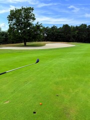 green golf course and blue sky