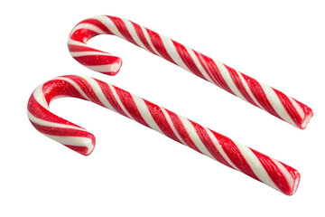 Obraz premium Two red and white striped candy canes isolated on transparent background