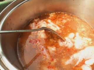 Cook meat stew in a pot