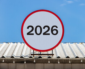 A Circle billboard with number 2026, is installed on a roof.