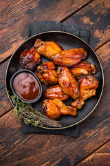 Deliciously sticky teriyakis sauce chicken wings, bursting with flavor, perfect for sharing at...