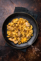 Traditional Central Asian dish Chon Kemin Valley. brown background. top view