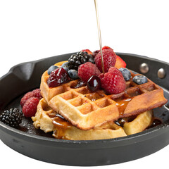 Belgian Waffles with Assorted Berries and Maple Syrup.