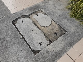 Concrete drain cover in the public park