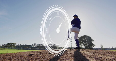 Lifting leg pitcher winding up on mound at field, holding ball, speedometer overlay, copy space © vectorfusionart