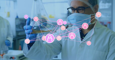 Scientist in safety gear at lab examining amber solution in flask, with network overlay, copy space