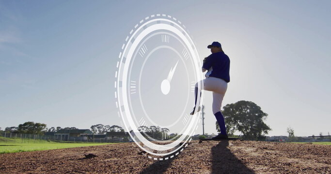 Lifting leg pitcher winding up on mound at field, holding ball, speedometer overlay, copy space - Powered by Adobe