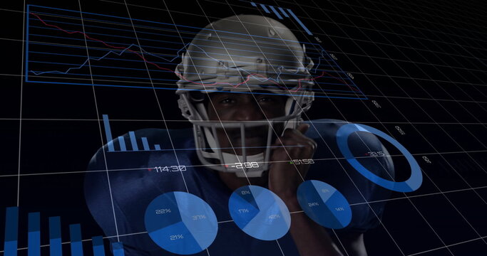 Standing football player presenting analytics in virtual studio with helmet, pads and data charts