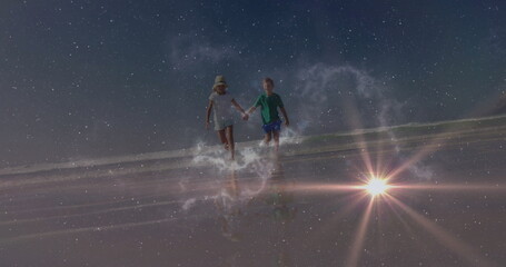 Kids running holding hands on low-tide beach under stars, straw hat, cosmic dust swirl, lens flare