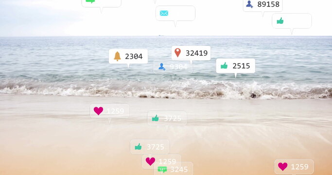 Floating cluster of social media icons drifting above sandy beach showing notification bubbles - Powered by Adobe