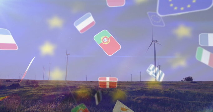 Showcasing cluster of wind turbines making clean energy in rural wind farm, with floating EU flags