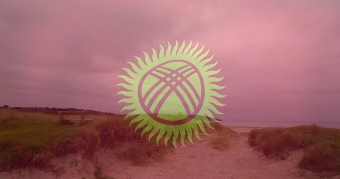 Naklejki Sandy pathway winding through grassy dunes toward shore with wooden bench and stylized sun emblem