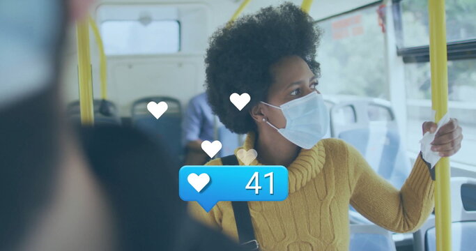 Standing female wearing mustard sweater, grasping handrail on bus, with 41 floating heart icons