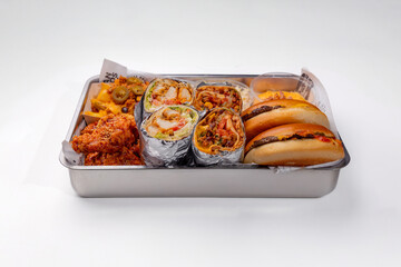 Set of burger, shawarma and french fries on a white background
