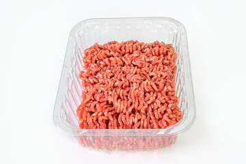 Plastic store package containing ground beef on white background