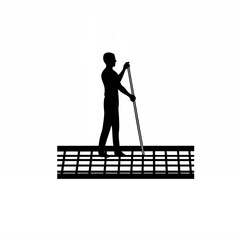 Obraz premium Silhouette of an urban planner using a measuring tape on a sidewalk