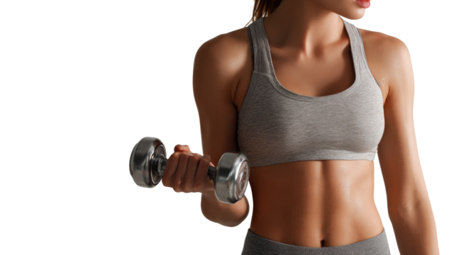 A fit woman lifts a dumbbell, showcasing her strength and dedication to fitness.