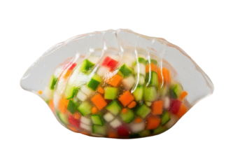 A single, perfectly formed crystal vegetable dumpling with a translucent wrapper showcasing vibrant green, orange, red chopped vegetables on a seamless transparent studio background, commercial food