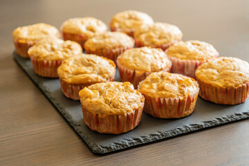 delicious pear muffin captured in close-up with a warm golden glow, perfect for autumn baking themes