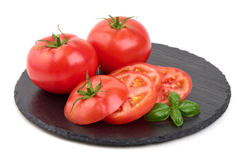 Sleced Tomatoes on Slate plate, isolated on white background.