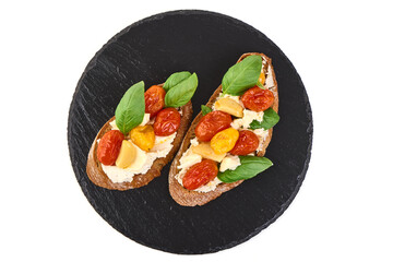 Tomato Bruschetta Bread with Ricotta and Basil, isolated on white background