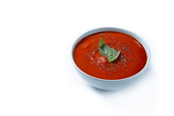Homemade Tomato Soup in bowl with Basil. Copy space
