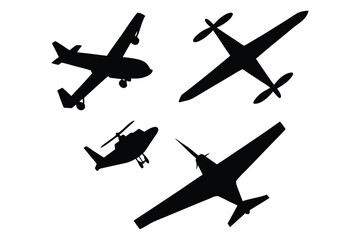 Collection of silhouetted aircraft including airplanes and helicopter